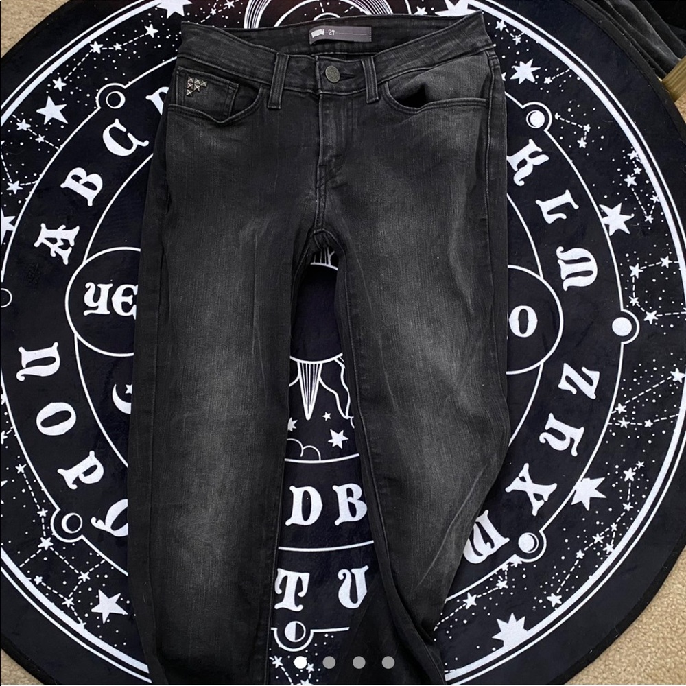 Levi’s black skinny jeans with studs